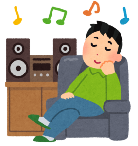 音楽セラピーで音楽を聴いてリラックスしている人