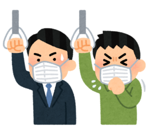 新型コロナウイルスの感染対策でマスクをして咳をする人